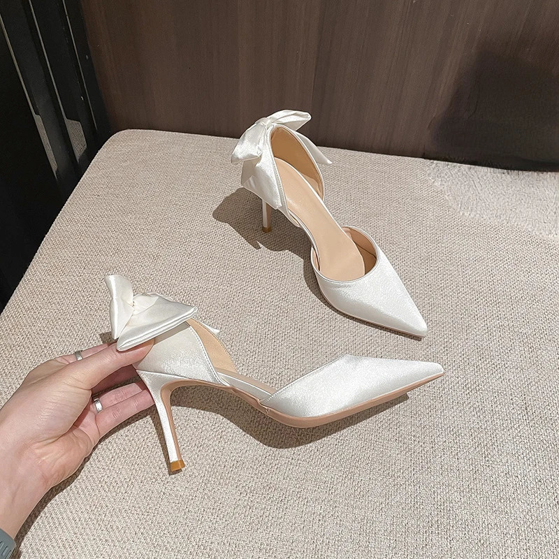 Solid Color Fashion Stiletto Bow Hollow Womens Wedding Shoes Womens Exquisite Shallow Mouth Satin High Heels 260306