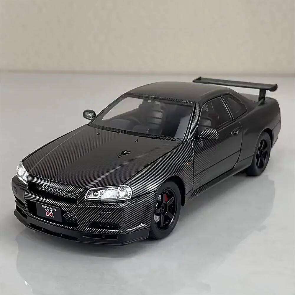 1:24 GTR R34 Miniature Model Diecast Alloy Car Toy 4 Doors Opened Sound Light Pull Back Front Wheel Steering Vehice for Boy Gift Z260307