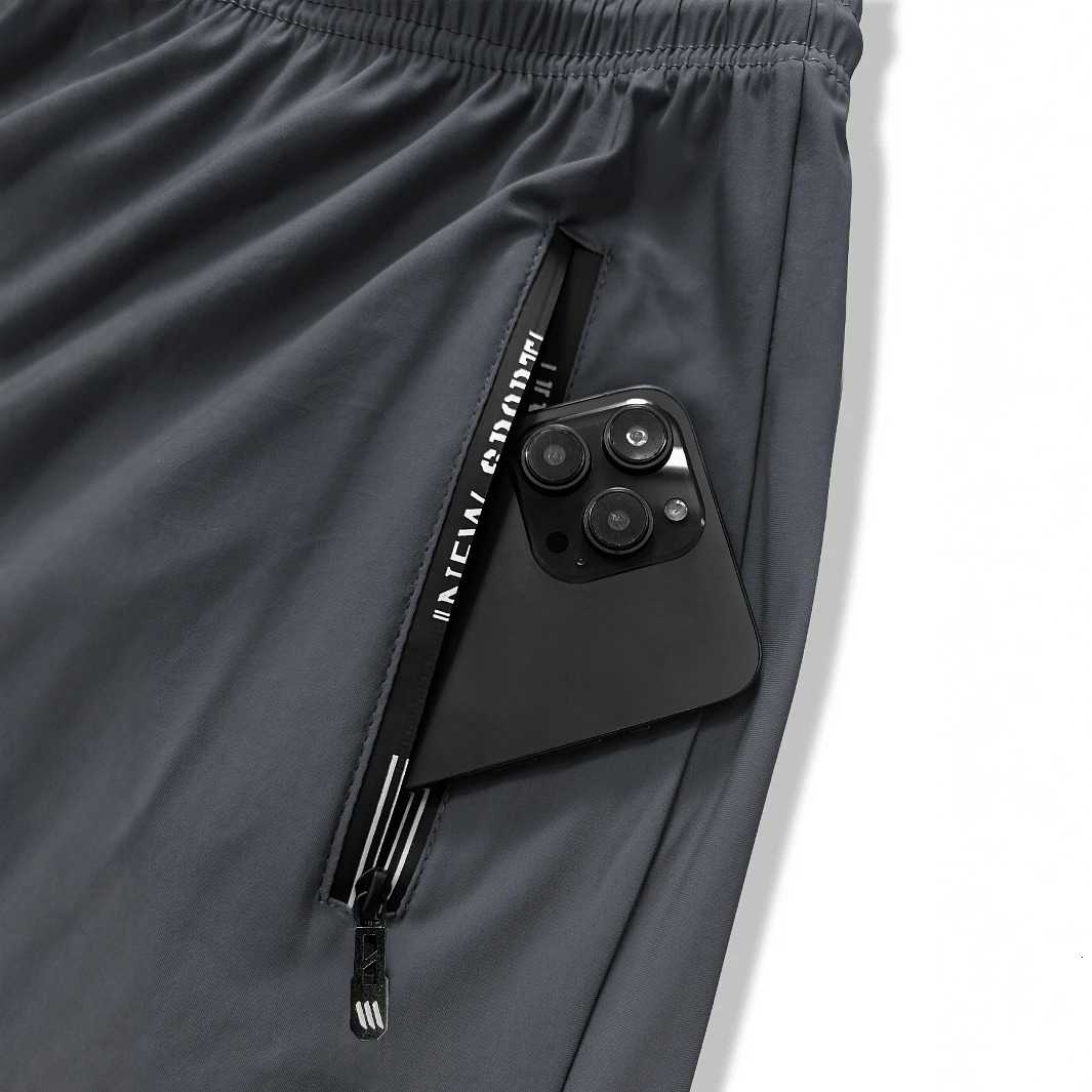 Men High Elasticity Ice Silky Joggers with Zipper Pockets Breathable Stretchy Athletic Pants for Running Gym and Outdoor Activit 260306