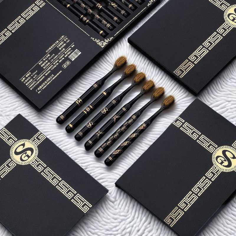 This black and white toothbrush gift box set provides gentle oral care for adults daily use.T260307