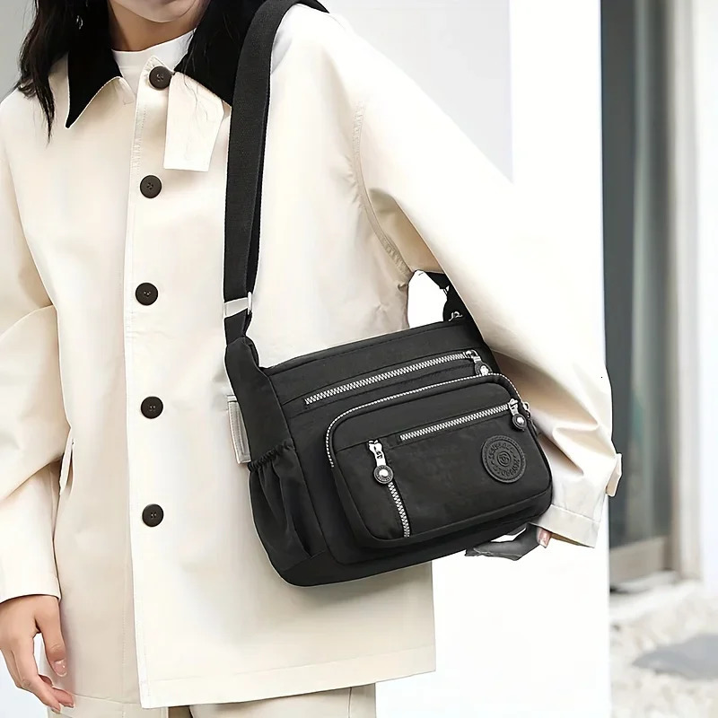 Waterproof Nylon Crossbody Bag Multiple Pockets Zipper Closure Stylish Casual Shoulder Bag for Travel Everyday Use 260306