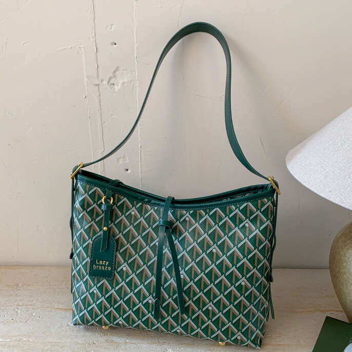 Trendy printed hand-held bucket bag Tote bag commuter mother-daughter bag shoulder bag French-style light luxury tote for women large-capacity handbag