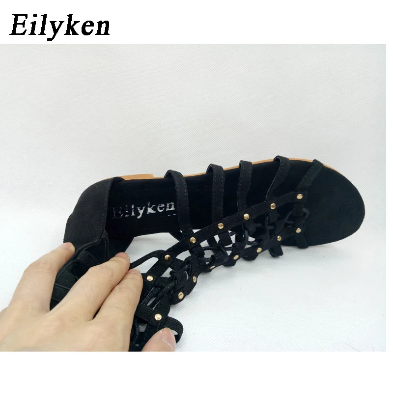Eilyken Women Sandals Strappy Open toe Knee High Summer Gladiator Flat Sandals Roman Bandage Casual Boots Shoes 260306