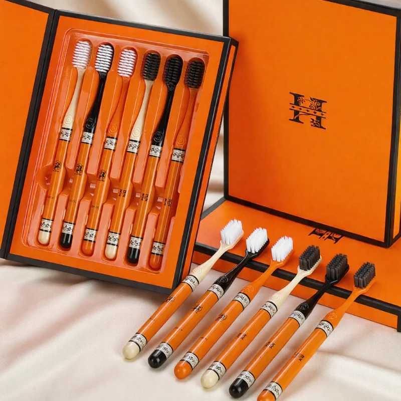 This 6-piece orange-themed toothbrush gift box set with soft bristles making it portable and ideal for adult daily home oral care.T260307
