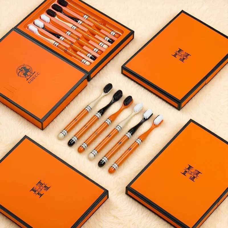 his 6-piece orange gift box toothbrush protects gums with soft bristles for adults and couples.T260307