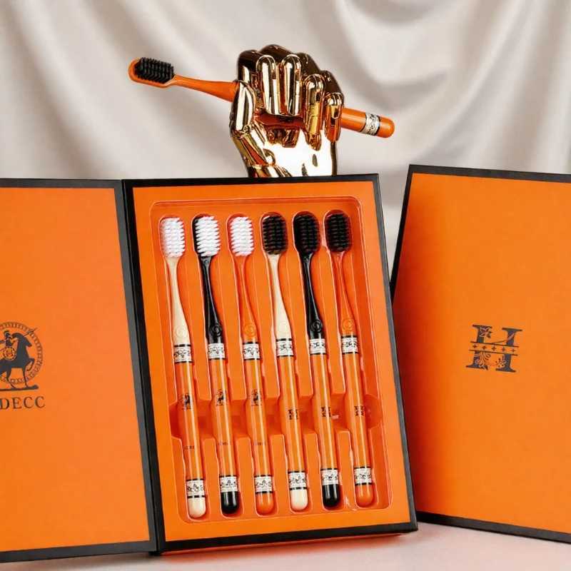 This 6-piece orange-themed toothbrush gift box set with soft bristles making it portable and ideal for adult daily home oral care.T260307