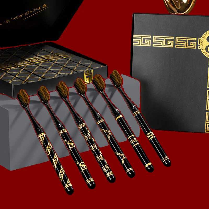 This high-end gift box toothbrush set features a black and gold light luxury design and a wide head, making it ideal for adult couples and family home