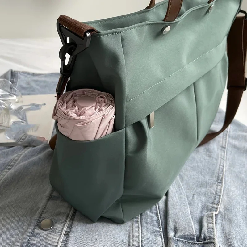 ner Womens Tote Bag Spacious Nylon Handbag Multiple Pocket Large Capacity Commuting Shoulder Lightweight Shopping 260228