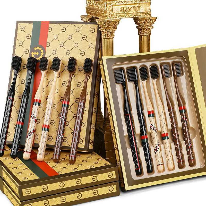 This 6-piece luxury monogram soft bristle toothbrush set with a comfortable handle is ideal for unisex adults in daily home oral care.T260307