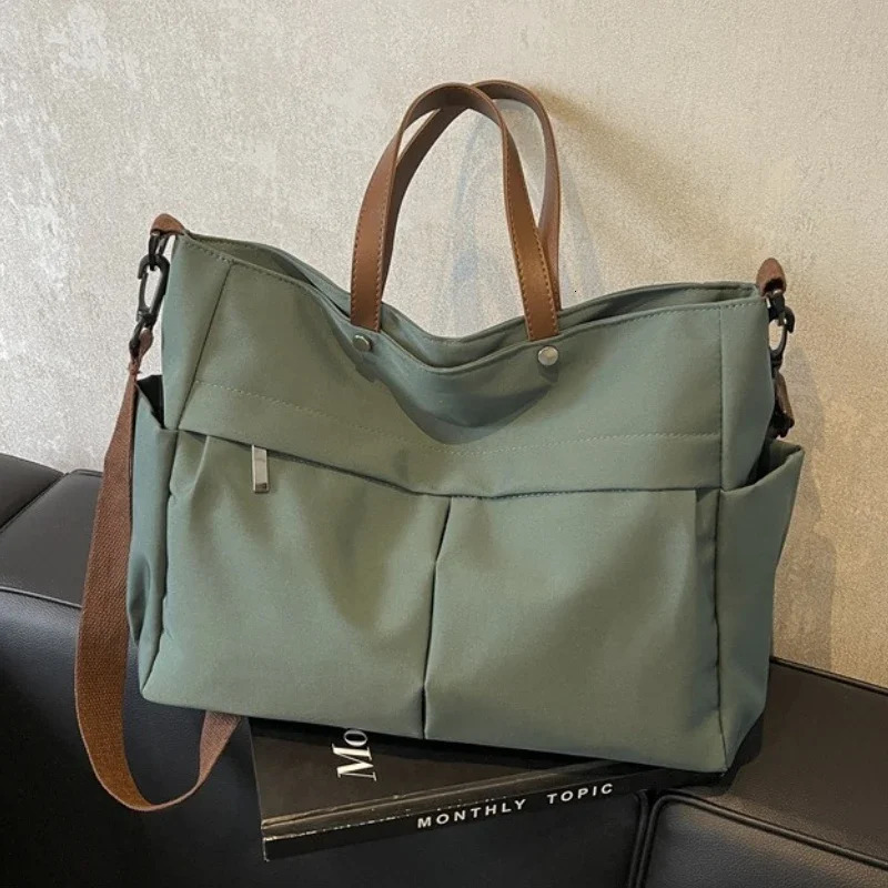 ner Womens Tote Bag Spacious Nylon Handbag Multiple Pocket Large Capacity Commuting Shoulder Lightweight Shopping 260228