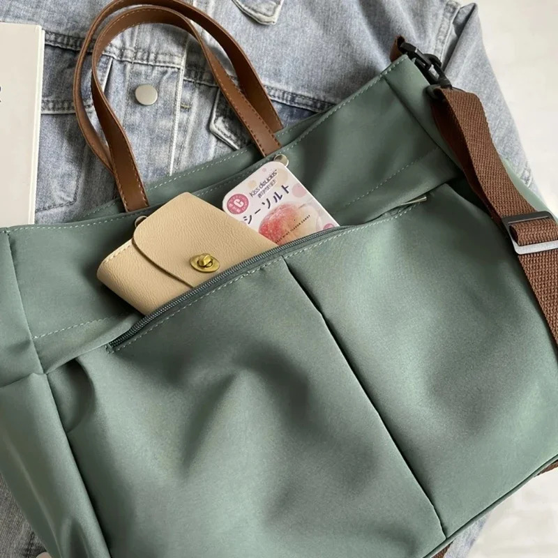 ner Womens Tote Bag Spacious Nylon Handbag Multiple Pocket Large Capacity Commuting Shoulder Lightweight Shopping 260228
