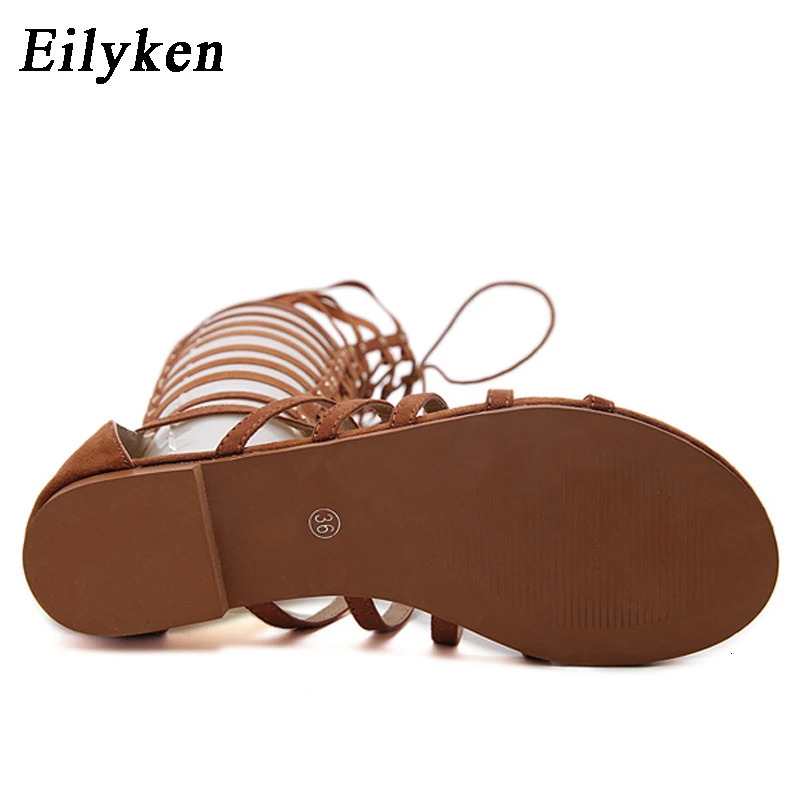 Eilyken Women Sandals Strappy Open toe Knee High Summer Gladiator Flat Sandals Roman Bandage Casual Boots Shoes 260306