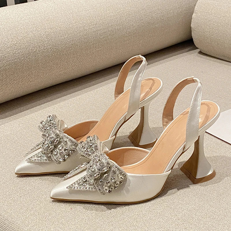Liyke Fashion Sequined Crystal Bowknot Women Pumps Sexy Pointed Toe Red High Heels Wedding Banquet Shoes Ladies Slingback Sandal 260306