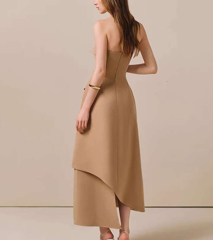 A sexy strapless dress with an asymmetrical hem that catches the attention of the goddess in the 2026 spring/summer niche design