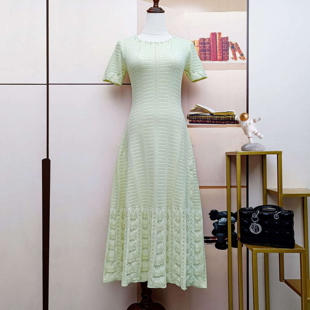 2026 designer French women's fashion summer new short sleeved knitted hollow slimming A-line dress