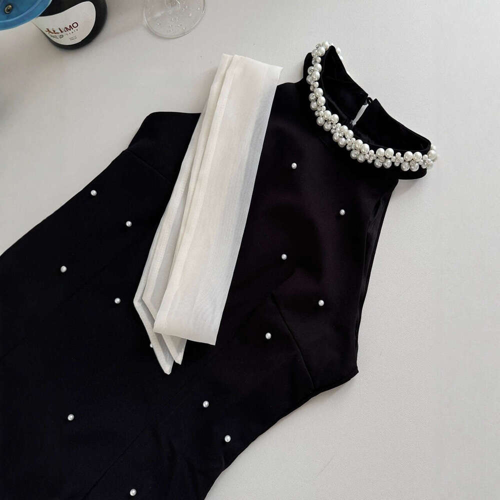 A12 Butterfly condensation back collar black 2026 summer loose fit A-line skirt decorated with unique bead embellishments