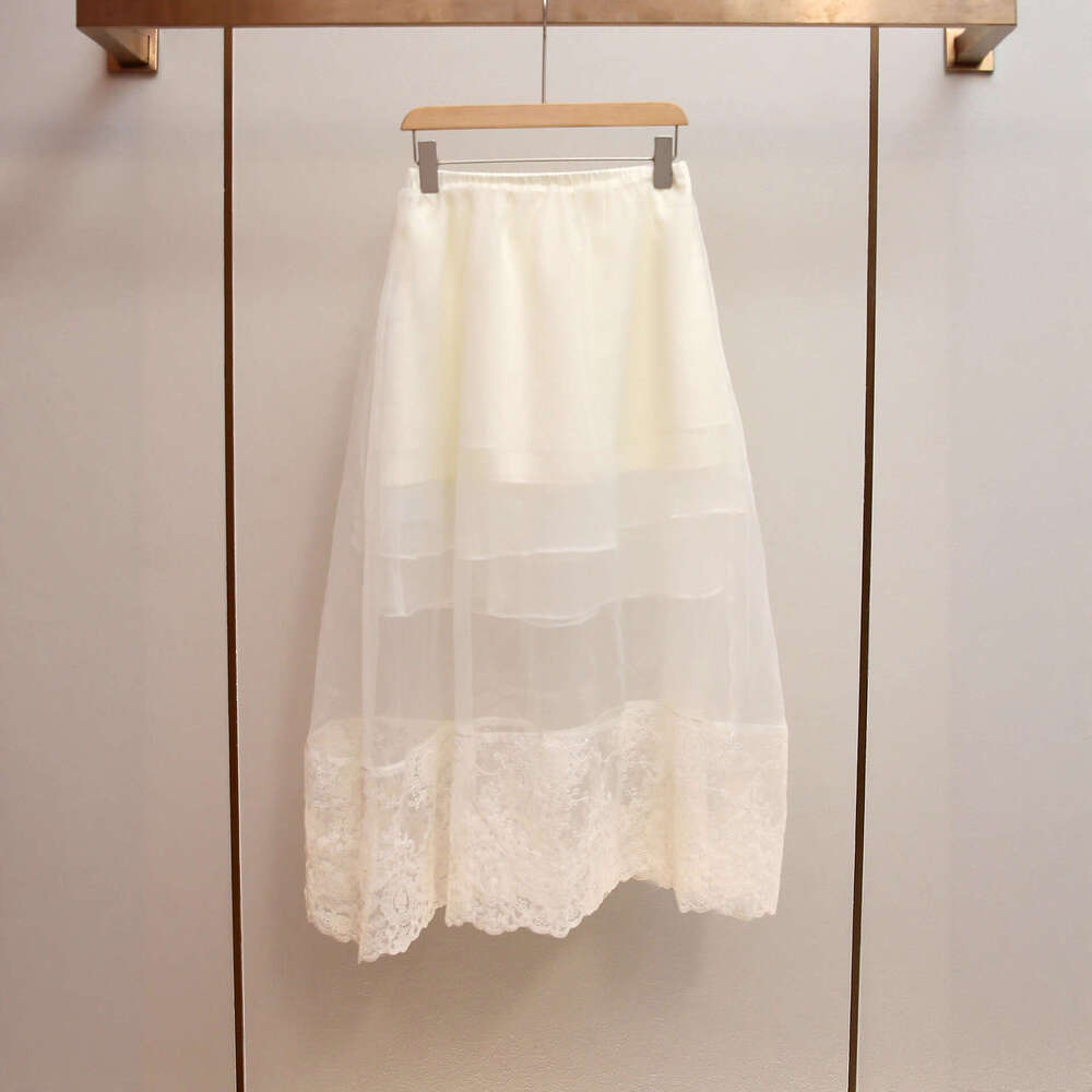 2026 high-end women's clothing autumn new style French romantic lace mesh patch medium long skirt