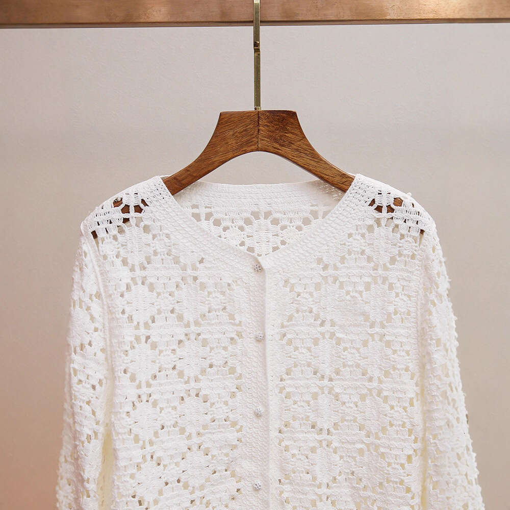 2026 high-end women's fashion autumn new item small fragrance crochet hollow long sleeved loose knit cardigan jacket