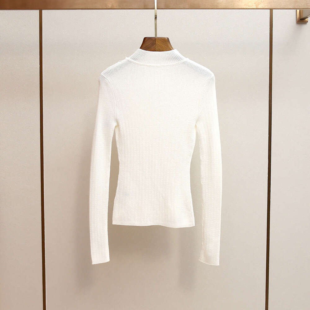 2026 designer high-end women's clothing autumn and winter new style French minimalist pearl decoration semi high neck slim knit top