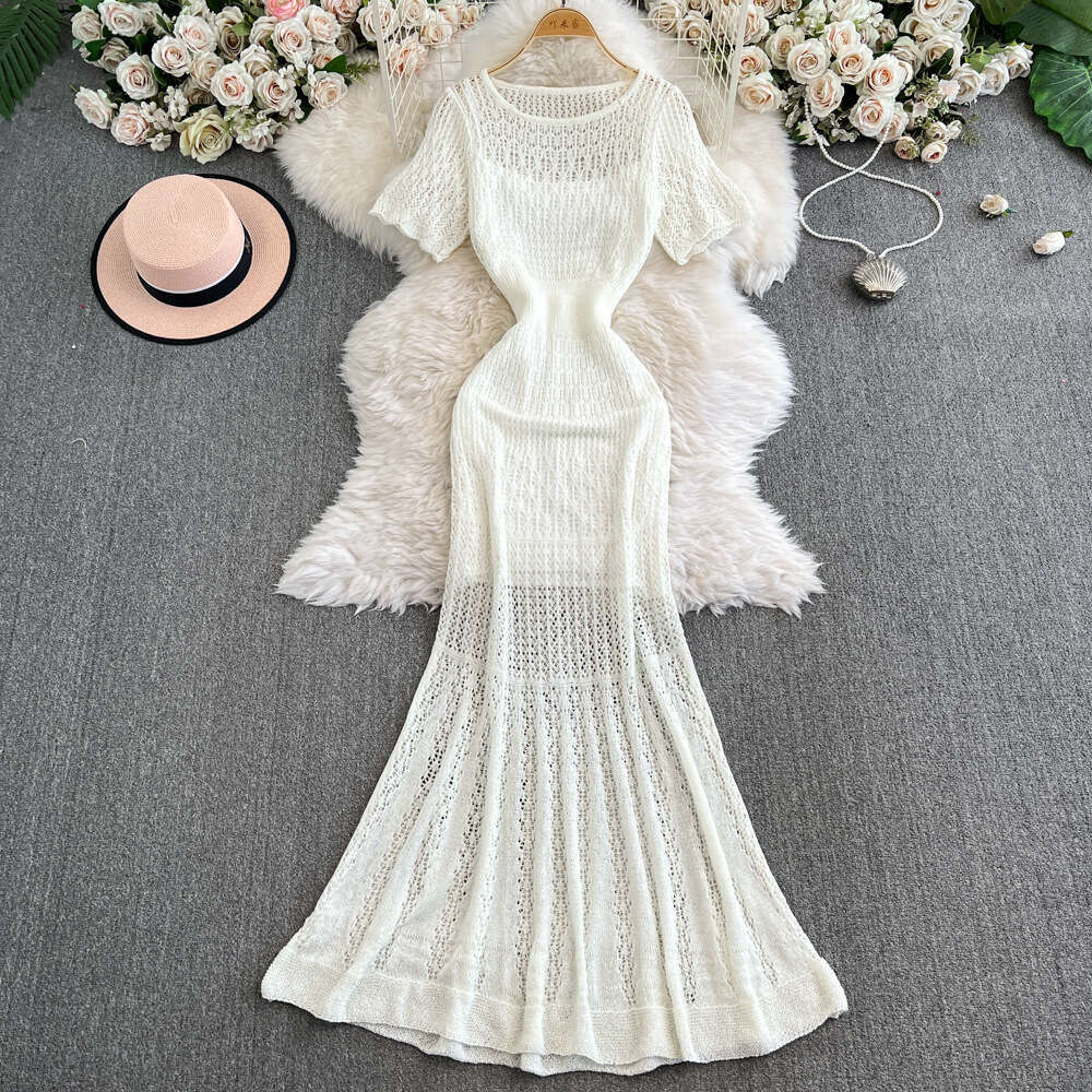 Cross A12 border European, American, French retro hollow women's knitted dress 2026 spring and summer new elegant waist cinching slimming