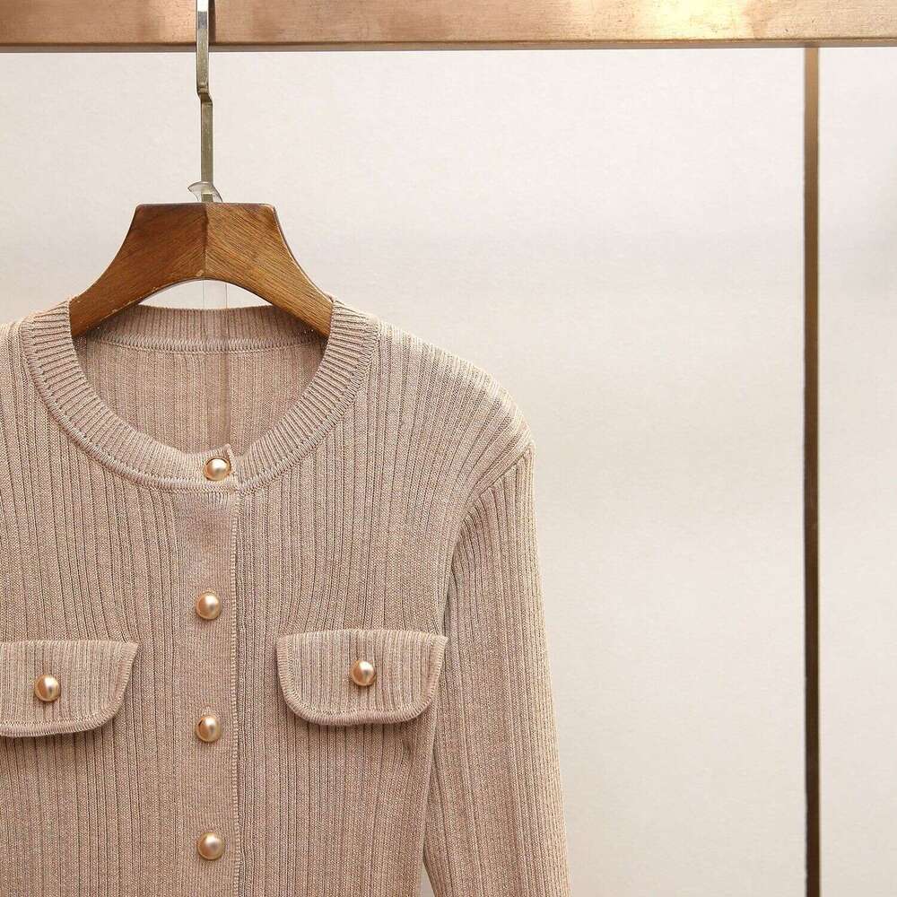 The new 2026 autumn and winter collection features high-density, elegant, and slim fitting A-line knitted dresses