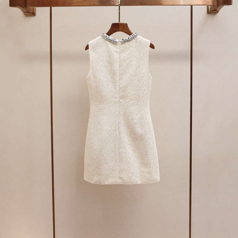 2026 Spring and Summer New French Elegant Social Style Hollow Round Neck Women's Slimming Dress