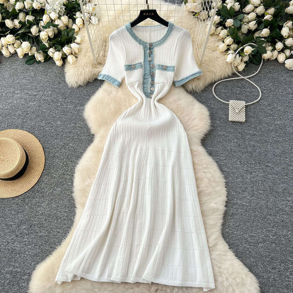 2026 designer's fashionable elegant denim patchwork dress with short sleeves, waist cinching, and knitted long sleeves