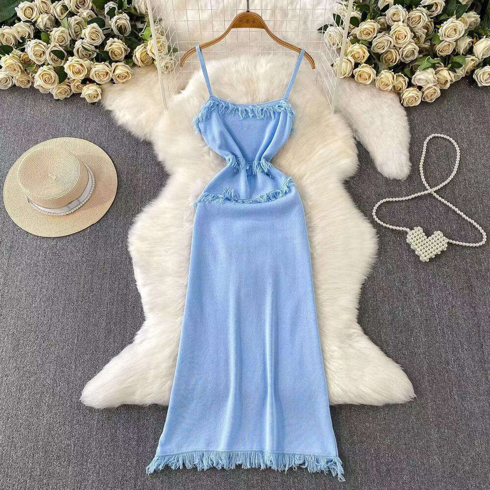 Pear shaped figure wearing slim fitting women's tank top skirt for spring and summer new trend, niche tassel knitted long skirt