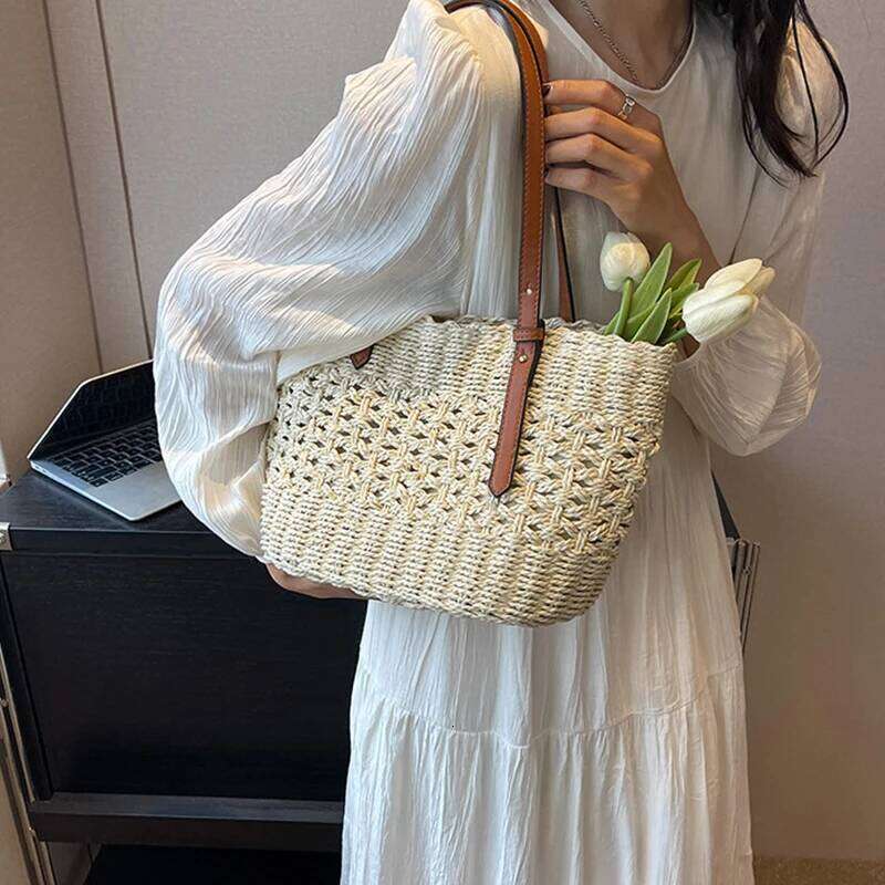 New Leather Handle Hollowed Out Handmade Straw With High-quality Seaside Vacation Shoulder Portable Beach Bag XJ260306