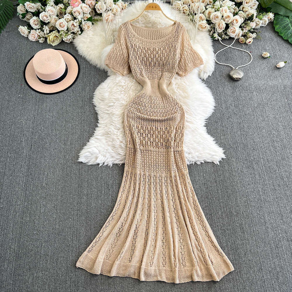 Cross border European, American, French retro hollow women's knitted dress 2026 spring and summer new elegant waist cinching slimming