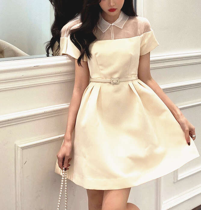 2026 Spring and Summer New Retro French Shirt Collar Hollow Transparent Hard Yarn Splicing Small Black Skirt