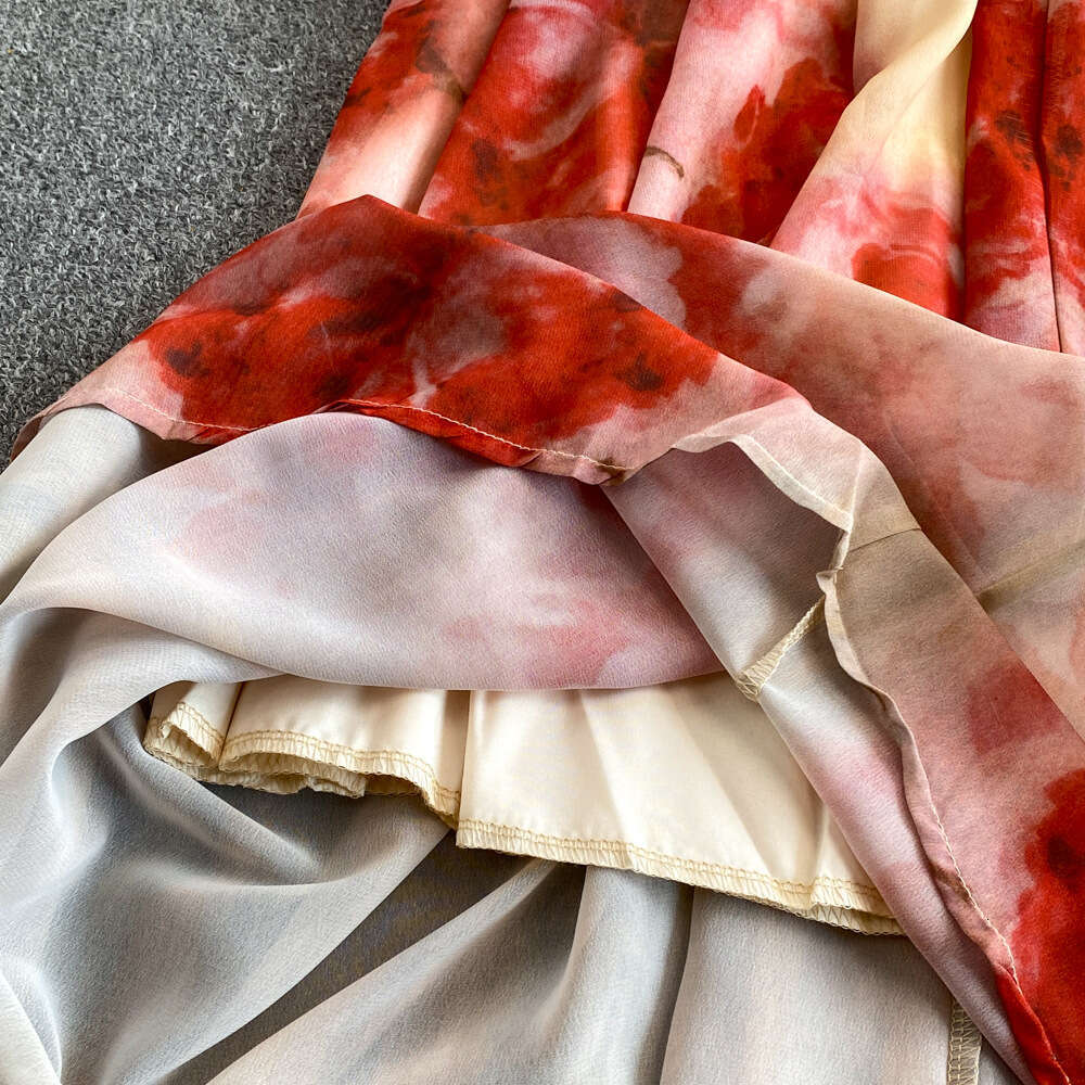 2026 designer niche high-end women's tie dye printed vest dress French pure sexy V-neck backless strapless long style