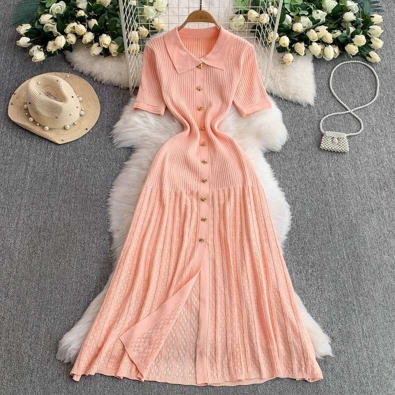 Elegant women's style short sleeved A-line new metal buckle waist slimming fish tail cut knitted dress 2026