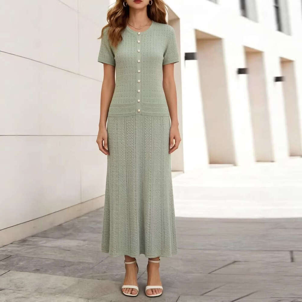 2026 French luxury socialite hollow round neck knitted women's autumn and winter high-end pearl slim elegant long skirt