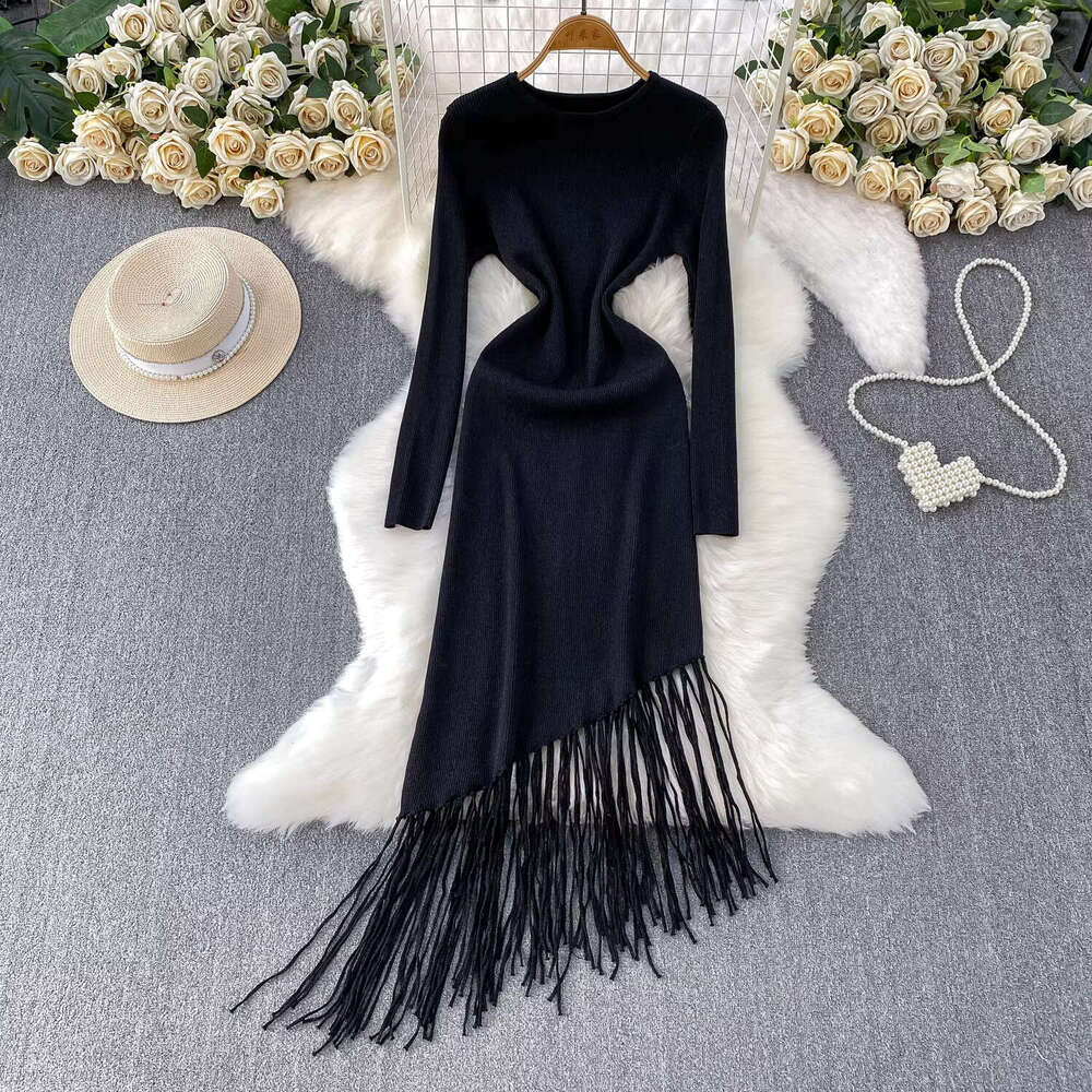 Elegant and delicate shiny silk knitted long sleeved women's 2026 French style new asymmetrical elegant tassel dress