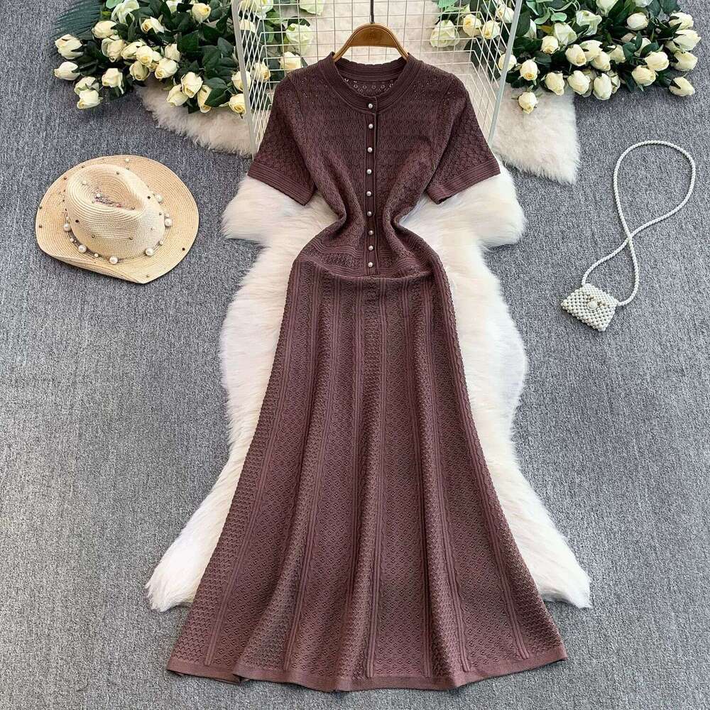French style new design round neck hollow knit fashionable and elegant A-line long skirt for spring and summer of 2026