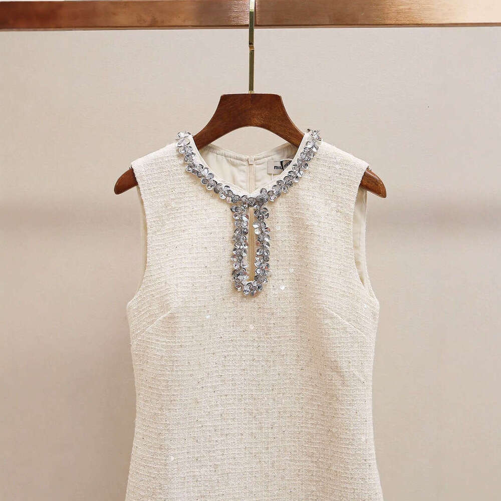 2026 Spring and Summer New French Elegant Social Style Hollow Round Neck Women's Slimming Dress