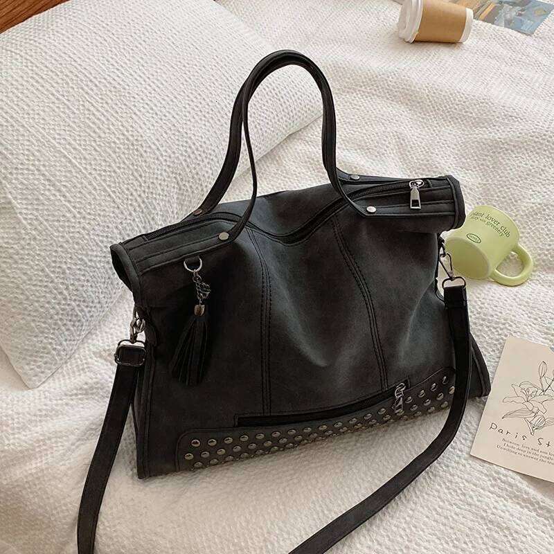 New 2023 rivet tassel motorcycle women's frosted hand-held shoulder tote designer luxury hand bag ladies XJ260306