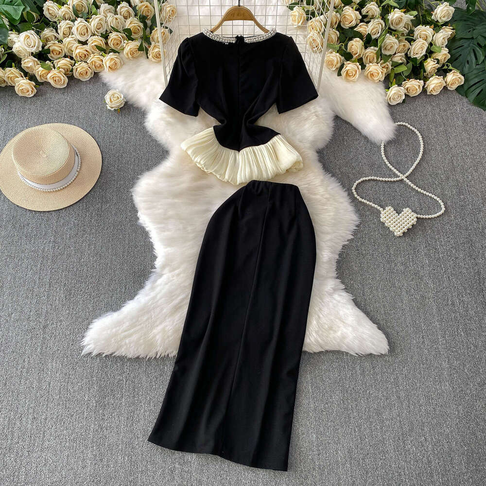 2026 European and American high-end A12 round neck beaded T-shirt paired with waist cinching skirt top slim half skirt two-piece set