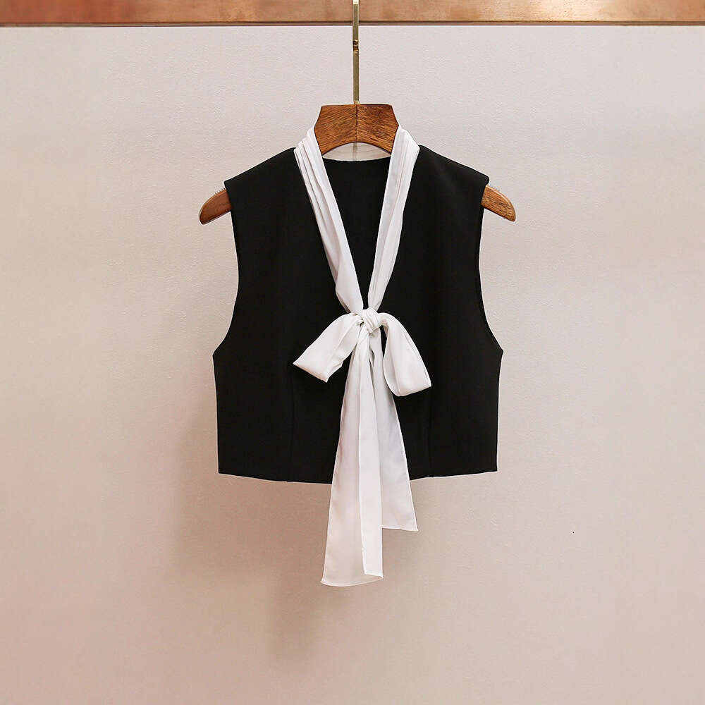 2026 autumn new French elegant social pleated color blocked bow V-neck women's short vest