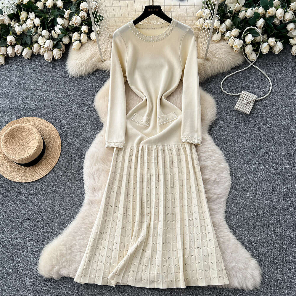 2026 autumn and winter designer's new European and American women's clothing style French round neck bead embellished knitted long sleeved d