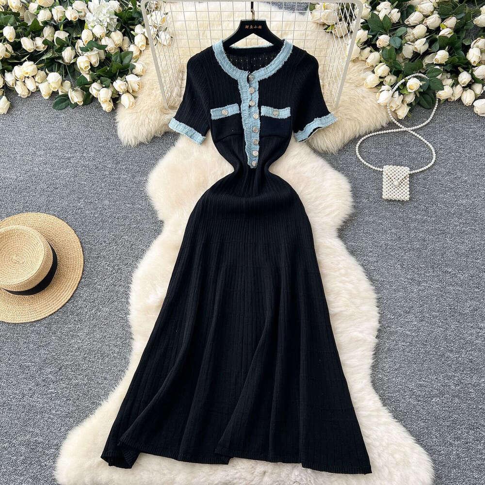 2026 designer's fashionable elegant denim patchwork dress with short sleeves, waist cinching, and knitted long sleeves