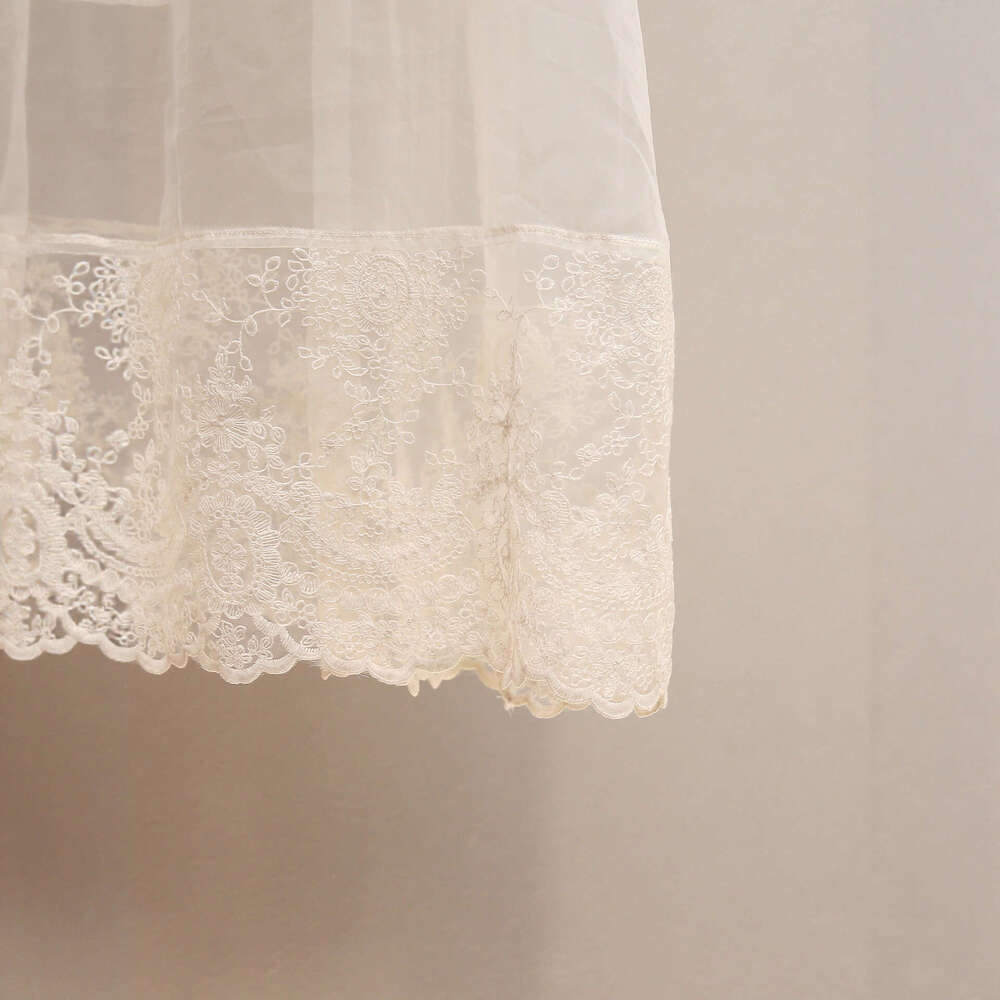 2026 high-end women's clothing autumn new style French romantic lace mesh patch medium long skirt