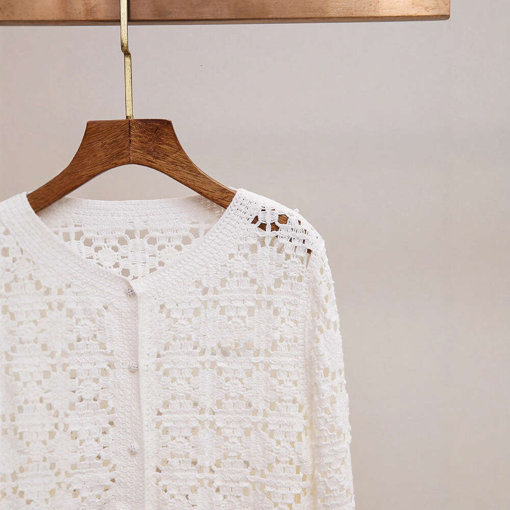 2026 high-end women's fashion autumn new item small fragrance crochet hollow long sleeved loose knit cardigan jacket