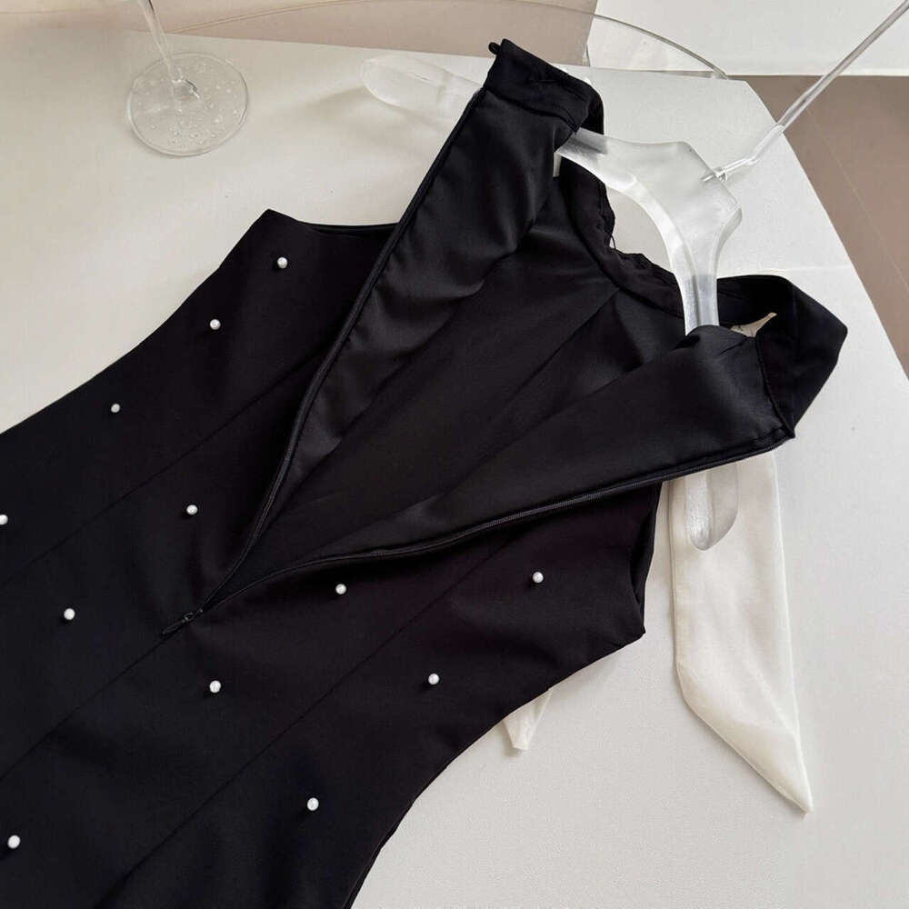 A12 Butterfly condensation back collar black 2026 summer loose fit A-line skirt decorated with unique bead embellishments