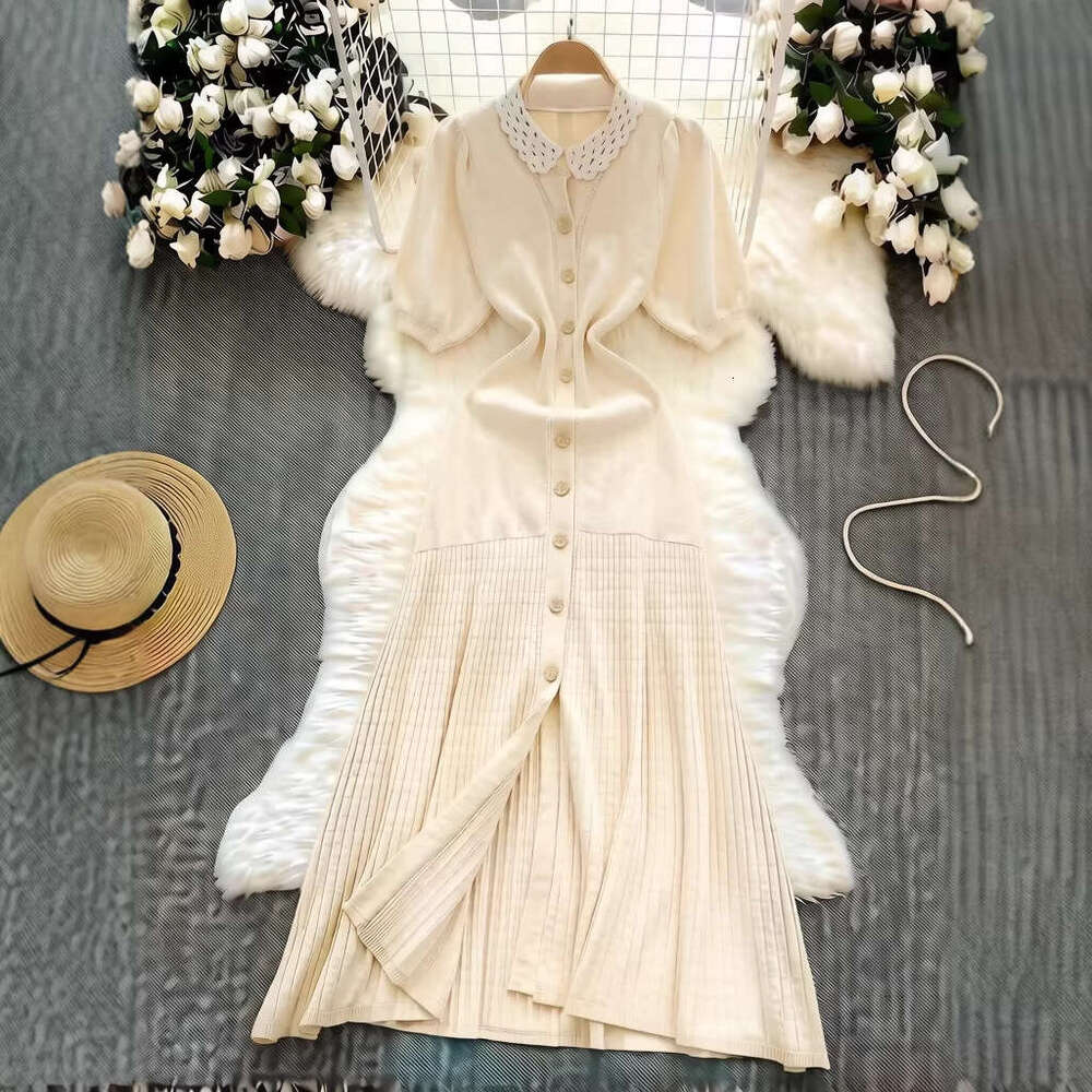 French elegant knitted women's summer single breasted pleated designer's unique and chic long skirt 2026