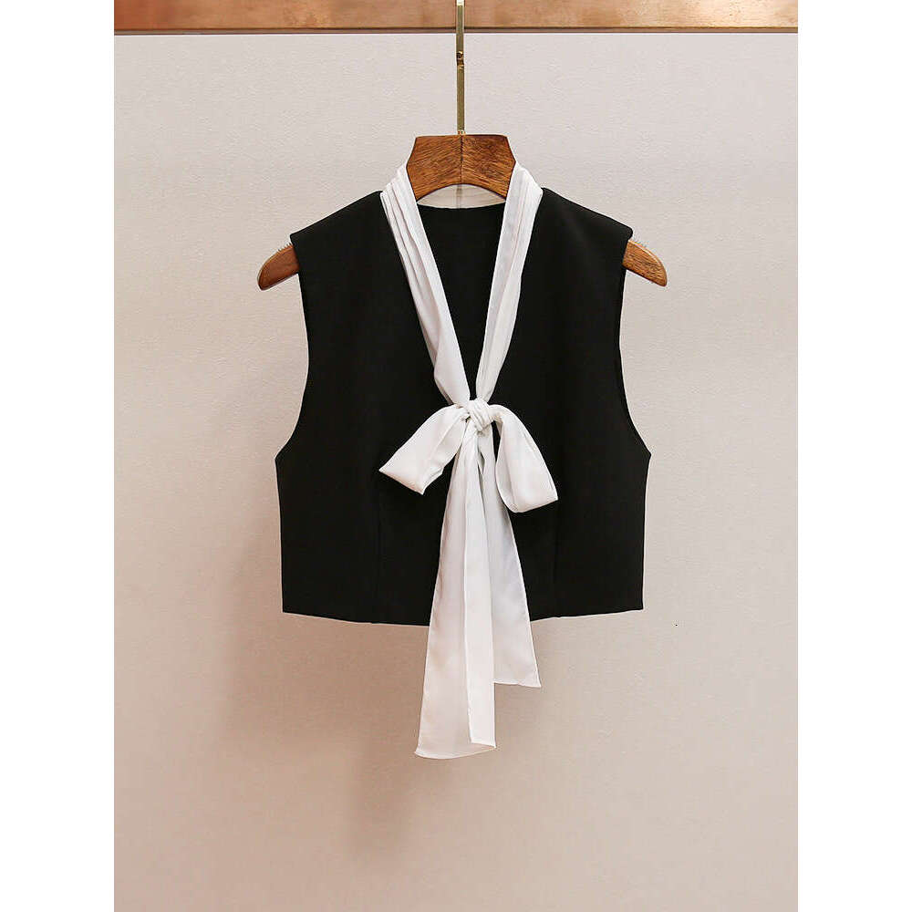 2026 autumn new French elegant social pleated color blocked bow V-neck women's short vest