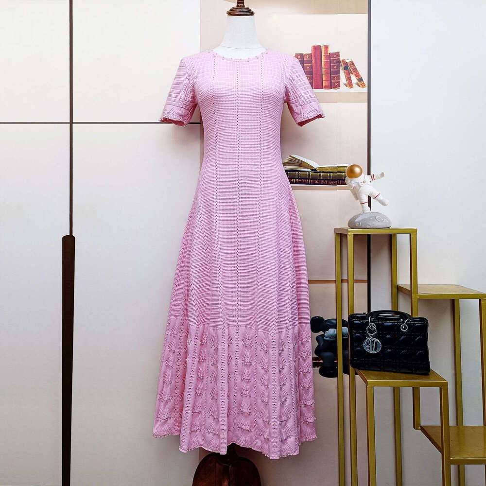 2026 designer French women's fashion summer new short sleeved knitted hollow slimming A-line dress