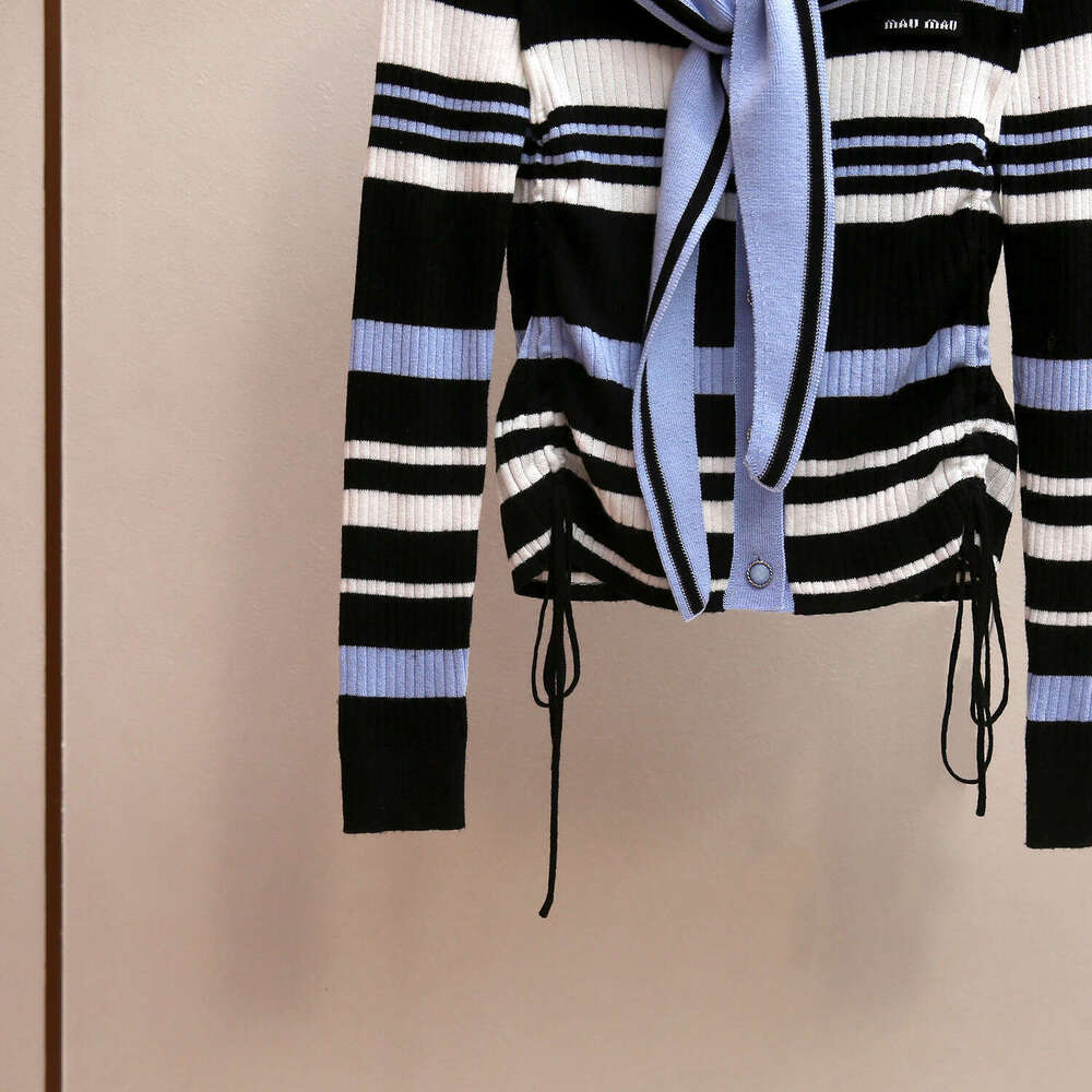 2026 designer high-end women's clothing autumn and winter new Korean style age reducing navy blue collar drawstring slim striped knitted top