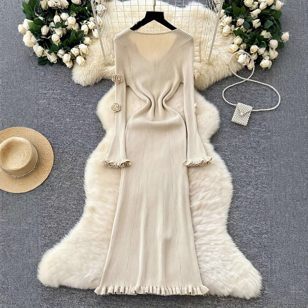 2026 European and American new women's long sleeved V-neck waist knit autumn and winter high-end French slim fit long skirt